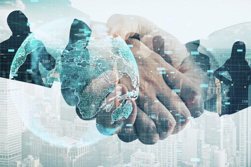 Business handshake with global data overlay representing trust, corporate communications, and reputation risk